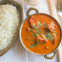 Chicken Tikka Masala · Boneless chicken prepared in Indian clay oven and finished in mildly spiced gravy.