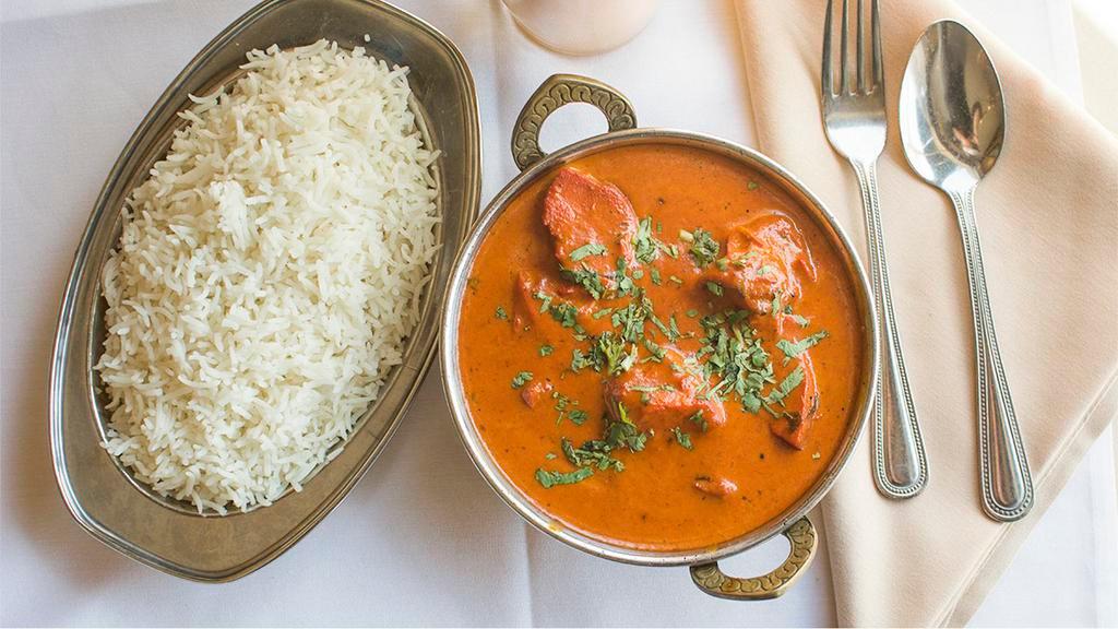 Chicken Tikka Masala · Boneless chicken prepared in Indian clay oven and finished in mildly spiced gravy.