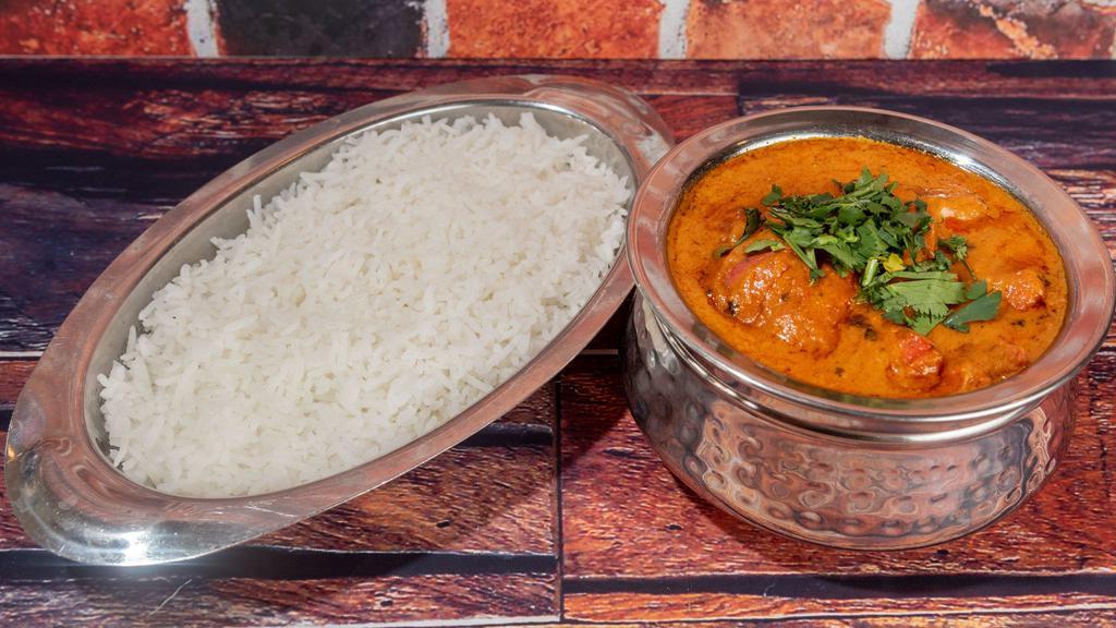 Butter Chicken · Boneless chicken prepared in Indian clay oven and cooked in butter based gravy.