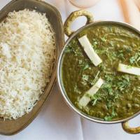 Palak Paneer · Paneer cooked in spinach flavored with spices.