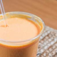 Mango Lassi · Cool churned yogurt drink with Mango.