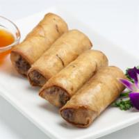 Spring Rolls · Crispy rolls stuffed with ground chicken, glass noodle, cabbage, taro and carrot served with...