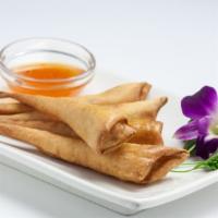 Winter Shrimp · Shrimp wrapped in the spring roll skin golden fried served with plum sauce.