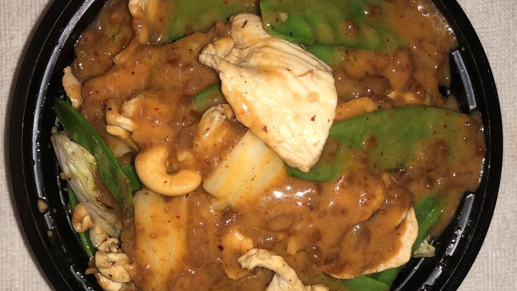 Pra Raam Chicken · Chicken, spinach, snow pea, Napa cabbage, cashew nut, and peanut sauce.
