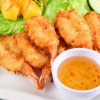 Coconut Shrimps (6) · Deep-fried shrimp coated with coconut serve with plum sauce.