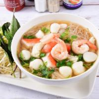 Phở - Sea Food · Shrimp, squid, imitation crab and fish balls. Rice noodles, broth, scallions, cilantro, onio...
