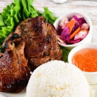 Pork Chop · Grilled Vietnamese pork chop with sweet fish sauce served with steamed white rice or sticky ...
