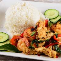 Shrimp & Squid Pad Kra Pao (Spicy Basil) · Spicy. Stir-fried shrimp and/or squid with fresh Thai chili, garlic, red bell peppers, and b...