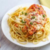 Chicken Parmesan With Pasta · Chicken breast topped with tomato basil sauce, mozzarella and parmesan cheese over pasta. Se...