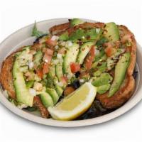Avocado Toast · Fresh sliced Haas avocado with a squeeze of lemon &
chili flakes, served on a slice of toast...