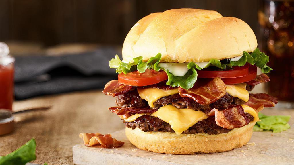 Double Bacon Smash® Burger · Double Certified Angus Beef, American cheese, applewood smoked bacon, lettuce, tomatoes, mayo, toasted bun