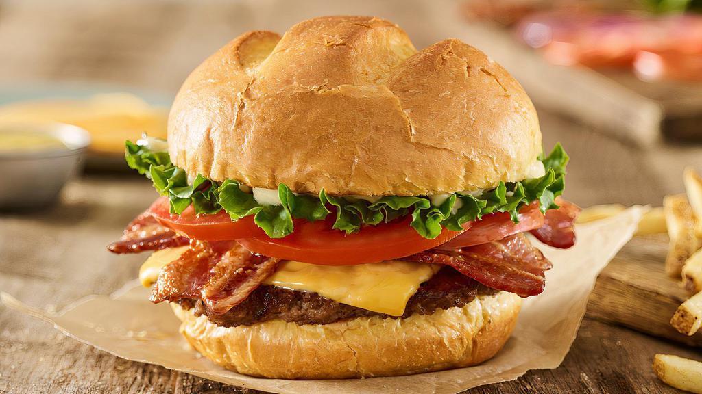 Bacon Smash® Burger · Certified Angus Beef, American cheese, applewood smoked bacon, lettuce, tomatoes, mayo, toasted bun