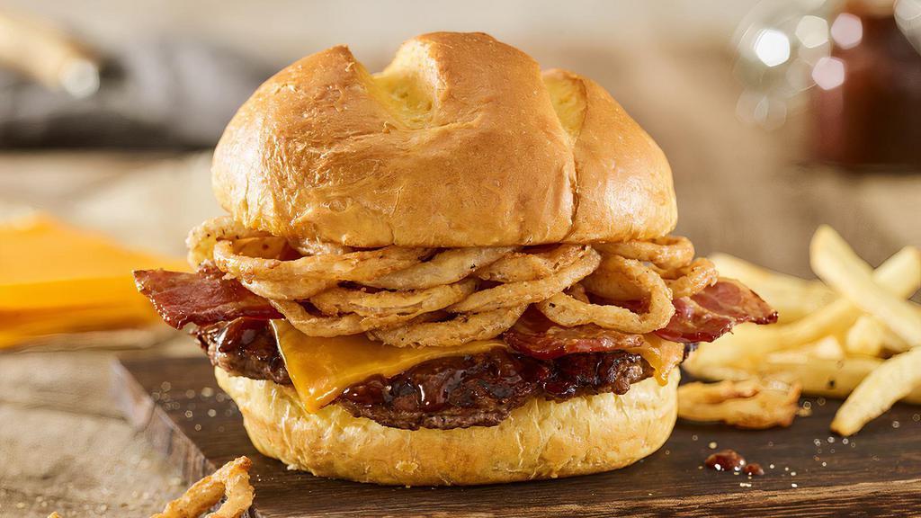 Bbq Bacon Cheddar Burger · Certified Angus Beef, aged cheddar cheese, applewood smoked bacon, haystack onions, bbq sauce, toasted bun