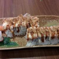 Awesome Roll · Shrimp tempura, imitation crab, cucumber and avocado roll topped w/ salmon, then baked w/ dy...