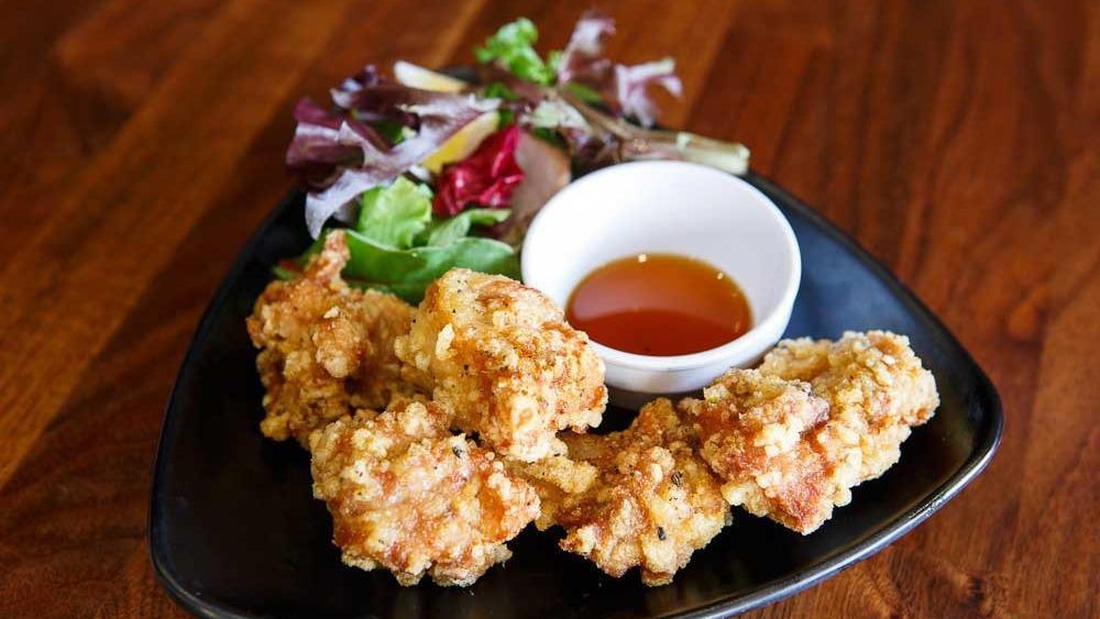 Crispy Chicken 5Pc · Juicy fried chicken thigh with an original garlic pepper served with mixed baby greens and Jinya's original ponzu sauce.