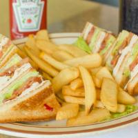Club Sandwich Combo · turkey, bacon, tomato, lettuce, mayo, served on white bread w/French Fries, and a soft drink