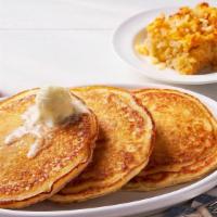 Classic Pancakes Bundle · 3 Buttermilk Pancakes n’ butter served with 100% Pure Natural Syrup and your choice of side.