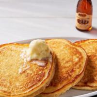 Buttermilk Pancakes – Three · Three Buttermilk Pancakes n’ butter.