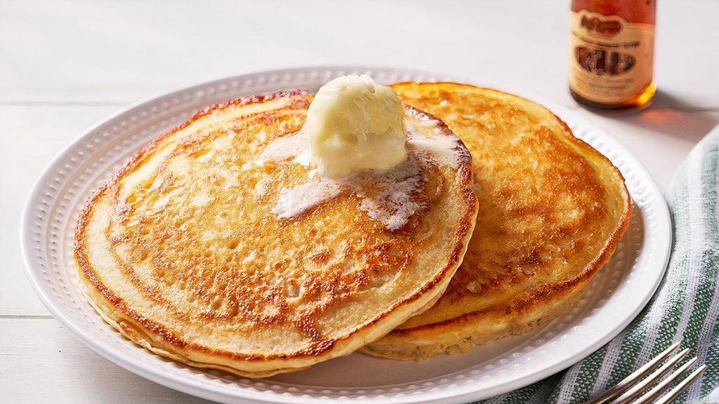 Buttermilk Pancakes – Two   · Two Buttermilk Pancakes n’ butter.