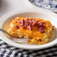 Loaded Hashbrown Casserole  · Our hashbrown casserole topped with Colby Cheese and bacon pieces.