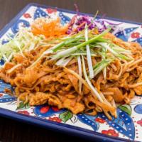 Pad Thai · The most famous thai rice noodles cooked with egg, bean sprouts, scallions and crushed peanu...