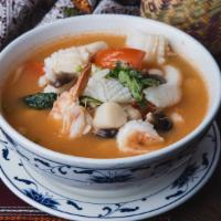 Tom Yum · Hot. Choice of chicken or shrimp with vegetables, lemongrass in hot & sour soup. Additional ...