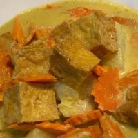Yellow Curry · Mild yellow curry in coconut milk with potato, onion and carrot.