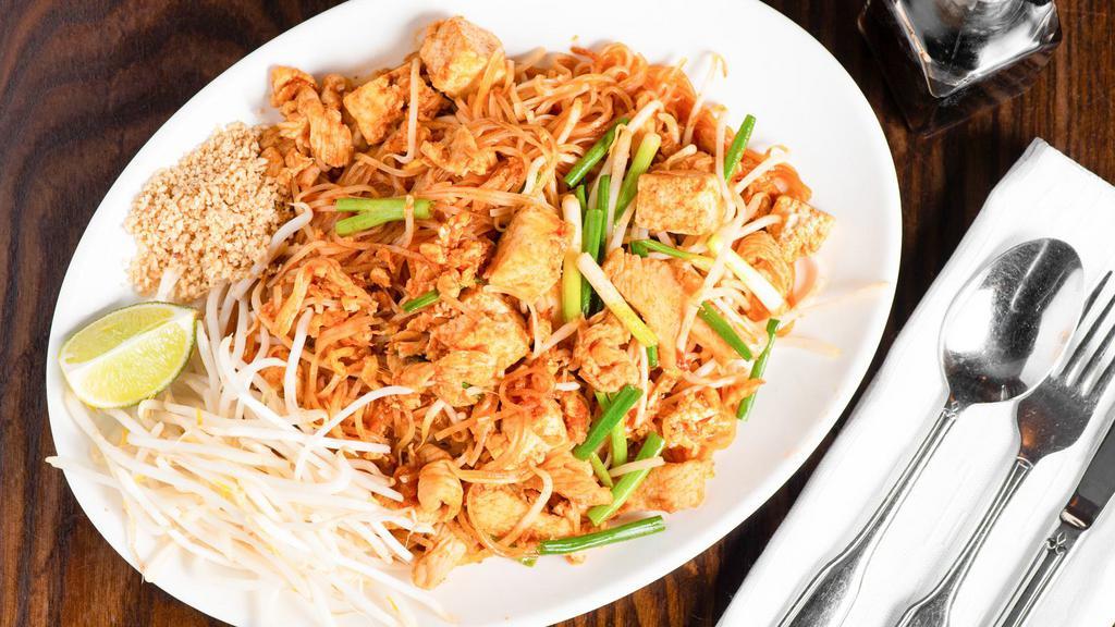 Pad Thai · Rice stick noodle stir fried with choice of meat, egg, tofu, bean sprout, green onion in pad Thai sauce, topped with ground peanut.