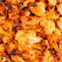 Harissa Roasted Cauliflower · with Red Onions & Parmesan Breadcrumbs