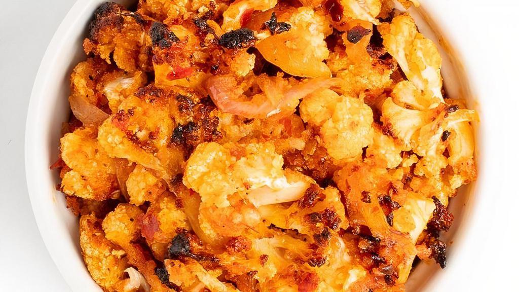 Harissa Roasted Cauliflower · with Red Onions & Parmesan Breadcrumbs