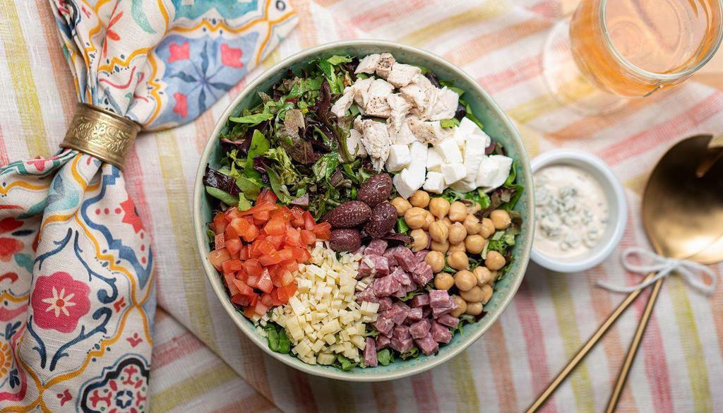 Signature Chop Salad · organic mixed greens, tomatoes, mozzarela, provolone, grilled chicken, salami, chickpeas, olives, red wine vinaigrette (on the side)