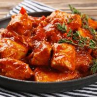 Chicken Tikka Masala · Delicious chicken cooked with special curry, tomato and yogurt sauce.