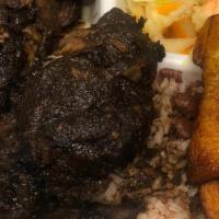 Jerk Chicken  · Served with rice and peas, cabbage and plantain