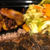Jerk Salmon  · Served with rice and peas, cabbage and plantain