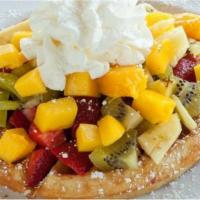Fruit Waffle · Freshly prepared waffle with butter, whipped cream and freshly cut fruit.