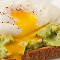 Avocado Toast · 2 Sunny side up eggs, fresh avocado, lemon, salt and pepper on white or wheat toast.