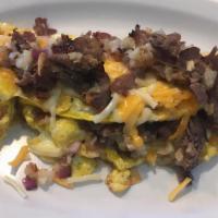 Steak Omelette · Eggs, beef, hash brown, red onion, and cheddar jack cheese.