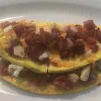 Chicken Bacon Omelette · Eggs, grilled chicken, bacon, red onion and cheddar jack cheese.