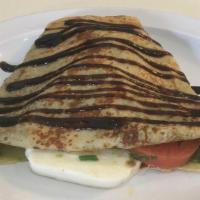 Turkey Pesto Crepe · Grilled sliced turkey, mozzarella and parmesan cheese, tomato, pesto sauce with balsamic gla...