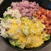 Chef Salad · Romaine lettuce, diced ham, diced turkey, diced tomato, cheddar jack cheese and ranch dressi...