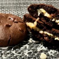 The Beijinho Cookie Brazil · Chocolate dough with dark chocolate drops.
 Filling: shredded coconut brigadeiro.  Toasted g...