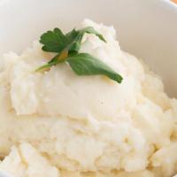 Mashed Potatoes · Creamy potatoes that have been mashed and mixed with milk butter and seasoning.