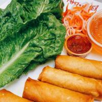 Fried Egg Rolls - Chicken · Served with romaine lettuce, house pickled carrots and daikon, and house fish sauce.