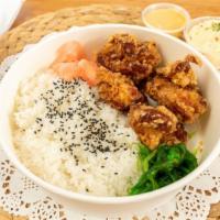 Crispy Chicken Bento · chicken thigh, spicy mayo, seaweed salad, white rice or chicken rice, add potato salad