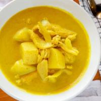 Yellow Curry · Contains chili paste. Yellow curry in coconut milk, onions, potatoes, carrots.