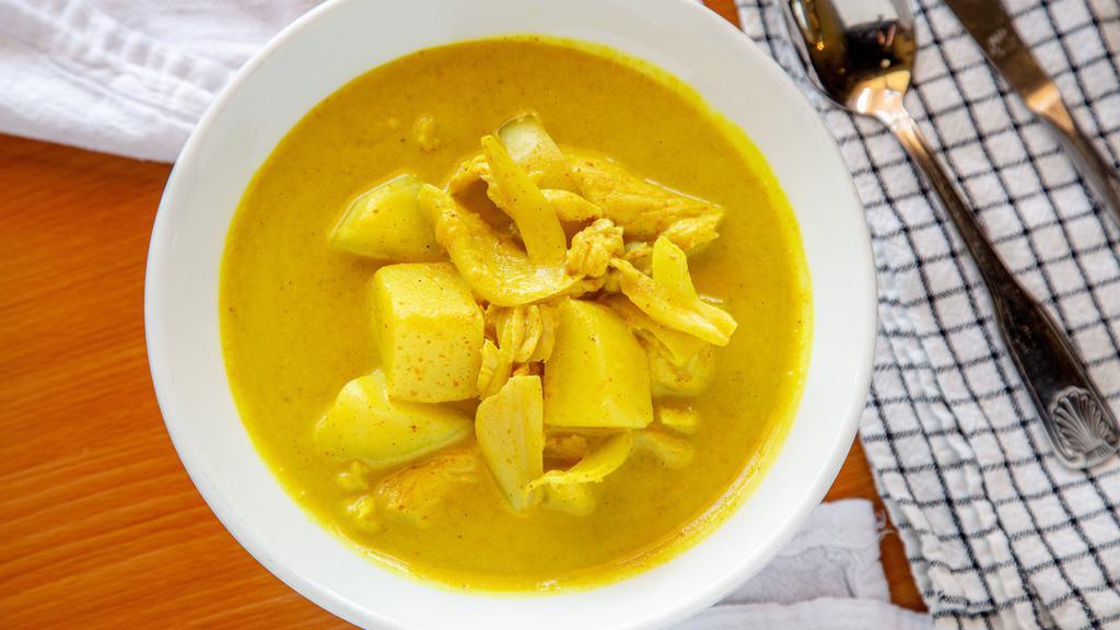Yellow Curry · Contains chili paste. Yellow curry in coconut milk, onions, potatoes, carrots.