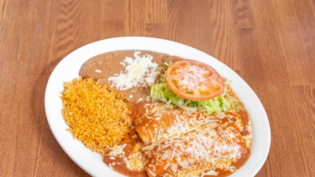 2 Enchiladas · Topped with red sauce and cheese.