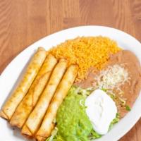 4 Flautas Plate · 4 Rolled taquitos with flour tortilla, choice of meat.sour cream,guacamole,lettuce