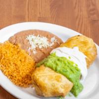 Chimichanga · Rice beans,cheese,meat,Topped with sour cream and guacamole,