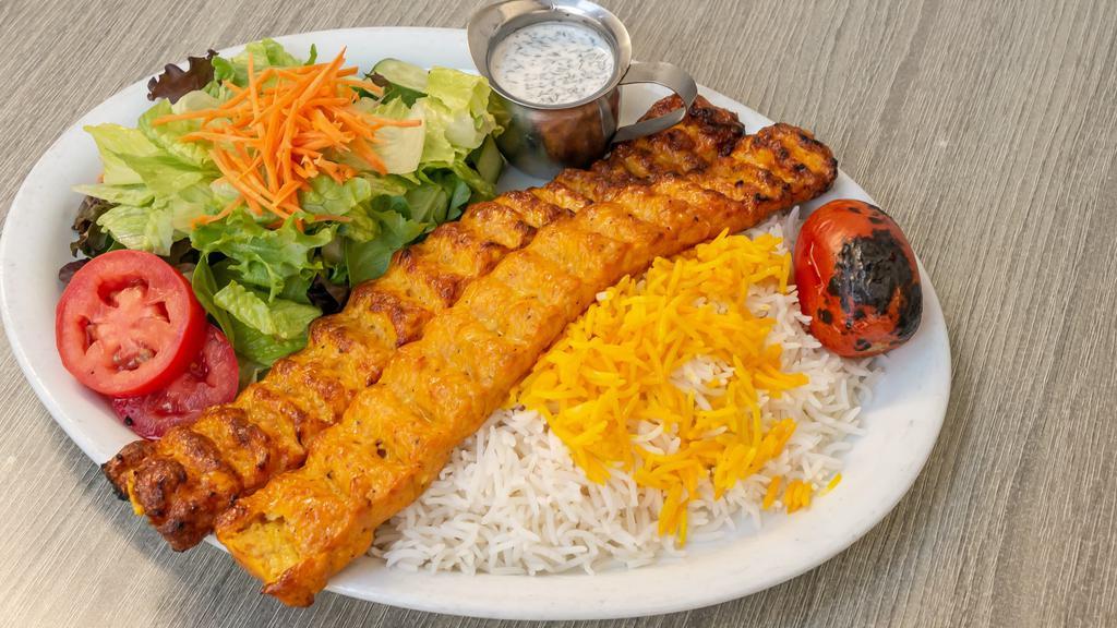 Chicken Koobideh · one skewer Seasoned grilled chicken mixed with grated onion, grilled on open flame.